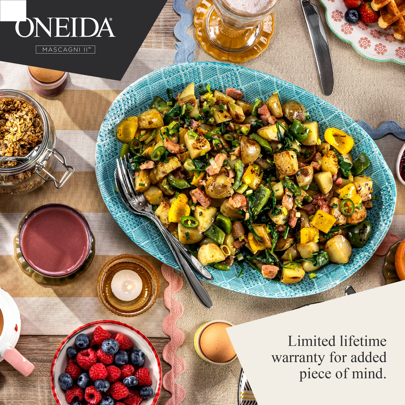 Oneida table setting with a dish of food, berries, and drinks on a wooden table.